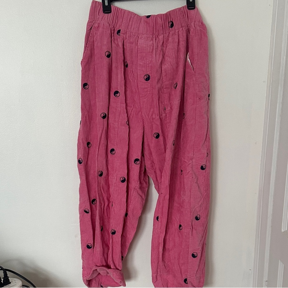 Urban outfitters pink corduroy pants with embroidered ying yang design